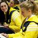 Michigan senior Sam Arnold smiles with her team while watching the selection broadcast at the Crisler Center on Monday, March 18. Daniel Brenner I AnnArbor.com